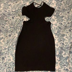 Open back black mini dress.